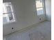 Unfurnished bedroom with two windows at 1440 Elm St, Martinsville, IN 46151