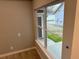 Spacious bedroom with large window and neutral wall color at 863 E Harrison St, Martinsville, IN 46151