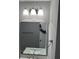 Bright bathroom with updated vanity and light fixture at 863 E Harrison St, Martinsville, IN 46151
