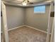 Spacious finished basement bedroom with neutral walls and carpet at 863 E Harrison St, Martinsville, IN 46151