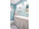 Updated bathroom with double vanity and light gray cabinets at 4237 Foxglove Trce, Indianapolis, IN 46237