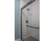 Shower with white subway tile and black fixtures at 4237 Foxglove Trce, Indianapolis, IN 46237