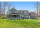 Gray two-story house with a screened porch and spacious backyard at 10706 Augusta Blvd, Fishers, IN 46037