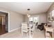 Bright dining room with table and chairs near kitchen at 10706 Augusta Blvd, Fishers, IN 46037
