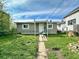 House exterior showcasing a large backyard at 4014 E 10Th St, Indianapolis, IN 46201
