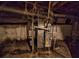 Unfinished basement with exposed pipes and HVAC system at 4014 E 10Th St, Indianapolis, IN 46201
