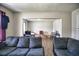 Open living area with wood floors and adjoining room at 4014 E 10Th St, Indianapolis, IN 46201
