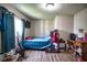 Simple bedroom with a double bed and a small workspace at 4014 E 10Th St, Indianapolis, IN 46201