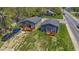 Aerial view of two houses with decks and a yard at 3002 N Olney St, Indianapolis, IN 46218
