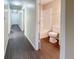 Simple bathroom with a toilet and shower/tub combination at 3002 N Olney St, Indianapolis, IN 46218