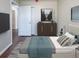 Bright bedroom featuring a comfortable bed and ample closet space at 3002 N Olney St, Indianapolis, IN 46218