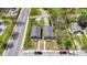 Two newly built gray houses with decks and yards, aerial view at 3002 N Olney St, Indianapolis, IN 46218