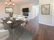Modern dining room with black marble table and chandelier at 3002 N Olney St, Indianapolis, IN 46218