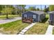Newly constructed gray house with wooden deck and small yard at 3002 N Olney St, Indianapolis, IN 46218