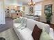 Open living room and kitchen with modern appliances at 3002 N Olney St, Indianapolis, IN 46218