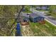 Aerial view of two houses with decks and a yard at 3002 N Olney St, Indianapolis, IN 46218