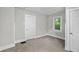 Bright bedroom featuring neutral walls and carpet at 332 Northern Ave, Indianapolis, IN 46208