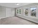 Spacious bedroom with neutral carpeting and ample natural light at 332 Northern Ave, Indianapolis, IN 46208