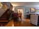 Elegant wooden staircase leading to upper level at 675 Woodruff Place West Dr, Indianapolis, IN 46201