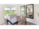 Dining area with wooden table and sliding glass door at 6941 E Bean Blossom Dr, Camby, IN 46113