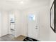 Inviting entryway with a view into the bedroom and plenty of natural light at 6941 E Bean Blossom Dr, Camby, IN 46113