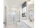 Clean bathroom with shower and double vanity at 6941 E Bean Blossom Dr, Camby, IN 46113