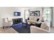 Spacious living room with neutral decor and large windows at 6941 E Bean Blossom Dr, Camby, IN 46113