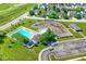 Community pool and playground with surrounding green space at 6941 E Bean Blossom Dr, Camby, IN 46113