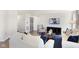 Living room with contemporary furniture and a large TV at 6941 E Bean Blossom Dr, Camby, IN 46113