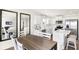 Modern kitchen with white cabinets and stainless steel appliances at 6941 E Bean Blossom Dr, Camby, IN 46113