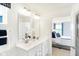 Bathroom with double vanity and view of bedroom at 6941 E Bean Blossom Dr, Camby, IN 46113