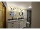 Basement bathroom featuring a double vanity and modern fixtures at 8827 El Rico Dr, Indianapolis, IN 46240