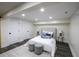 Spacious basement bedroom with plush bed and plenty of natural light at 8827 El Rico Dr, Indianapolis, IN 46240