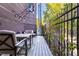 Long deck with string lights and outdoor furniture, ideal for entertaining at 1336 Central Ave, Indianapolis, IN 46202