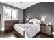 Spacious bedroom with dark gray walls and a large window at 1336 Central Ave, Indianapolis, IN 46202