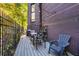 Deck with string lights, grill, and seating area, great for outdoor dining at 1336 Central Ave, Indianapolis, IN 46202