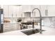 Modern kitchen with white cabinets and a stainless steel sink at 1336 Central Ave, Indianapolis, IN 46202