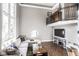 Relaxing living room with a sectional sofa and a loft-style upper level at 1336 Central Ave, Indianapolis, IN 46202