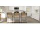 Modern kitchen with white cabinets and an island at 3798 Andean Dr, Bargersville, IN 46106