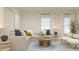 Bright living room featuring a sectional sofa and large windows at 3798 Andean Dr, Bargersville, IN 46106