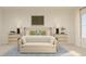 Main bedroom with light wood furniture and a cozy bench at 3798 Andean Dr, Bargersville, IN 46106
