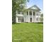 Grand two-story home with white columns and lush green lawn at 1515 S Park Ave, Alexandria, IN 46001