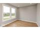 Spacious bedroom with neutral walls and hardwood floors at 15287 Garden Mist Pl, Fishers, IN 46037