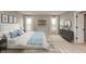 Serene bedroom with a king-size bed, dresser, and plenty of natural light at 15287 Garden Mist Pl, Fishers, IN 46037