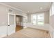 Bright office with wainscoting and built-in shelving at 15287 Garden Mist Pl, Fishers, IN 46037