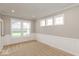 Spacious office with large windows and neutral decor at 15287 Garden Mist Pl, Fishers, IN 46037