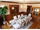 Elegant dining room featuring a large table, chandelier, and hardwood floors at 909 E 38Th St, Indianapolis, IN 46205