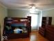 Bedroom with bunk beds and wood floors at 909 E 38Th St, Indianapolis, IN 46205