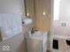 Small bathroom with a vanity and toilet at 909 E 38Th St, Indianapolis, IN 46205