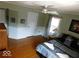 Bedroom with a queen bed and wood floors at 909 E 38Th St, Indianapolis, IN 46205